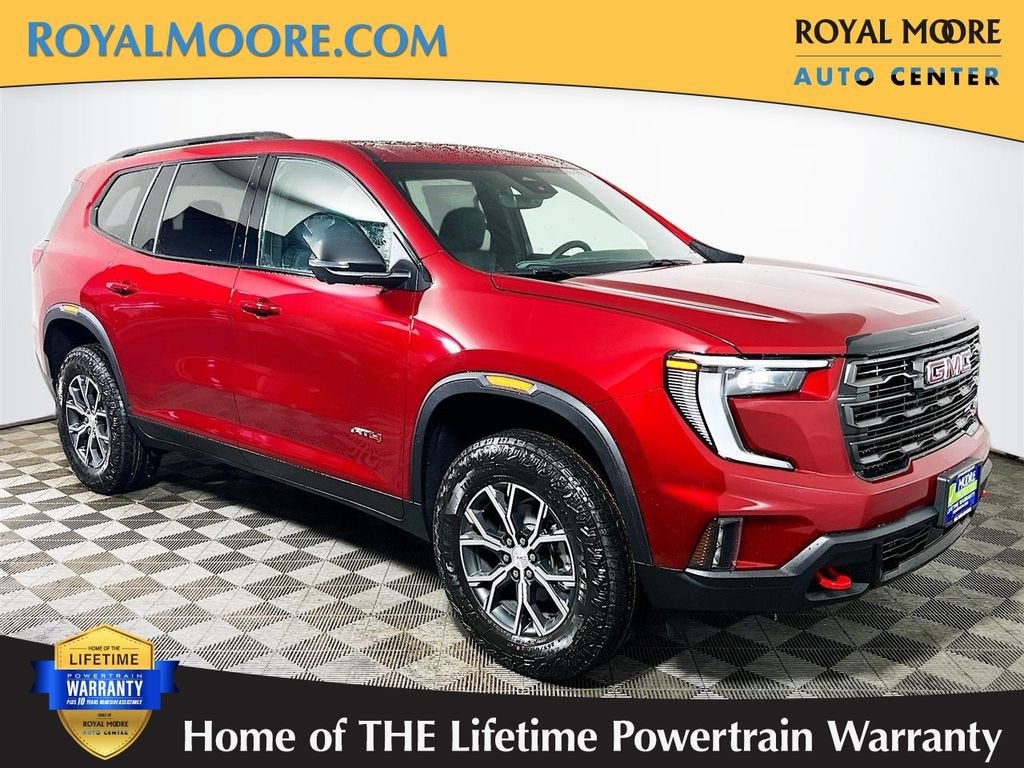 2026 GMC Acadia AT4 in Volcanic Red Tintcoat — front three-quarter view