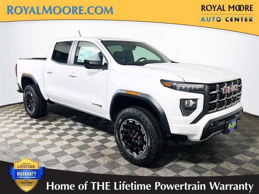 2026 GMC Canyon AT4 in Summit White — front three-quarter view