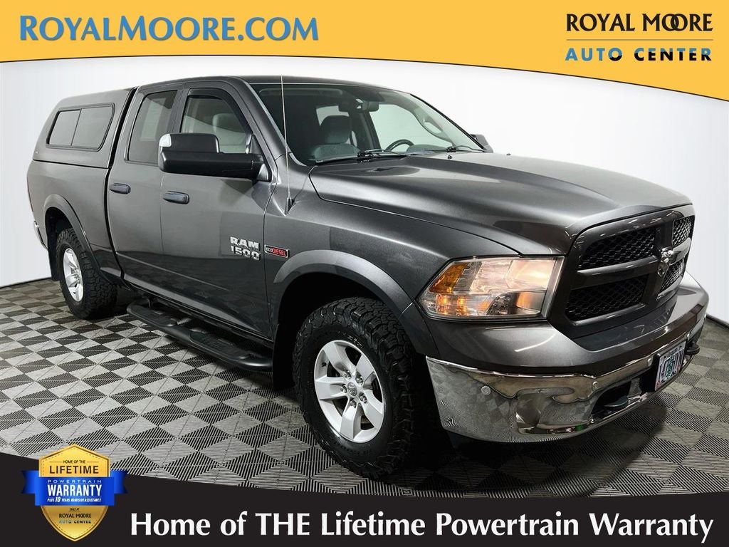2016 RAM 1500 Outdoorsman in Granite Crystal Metallic Clearcoat — front three-quarter view