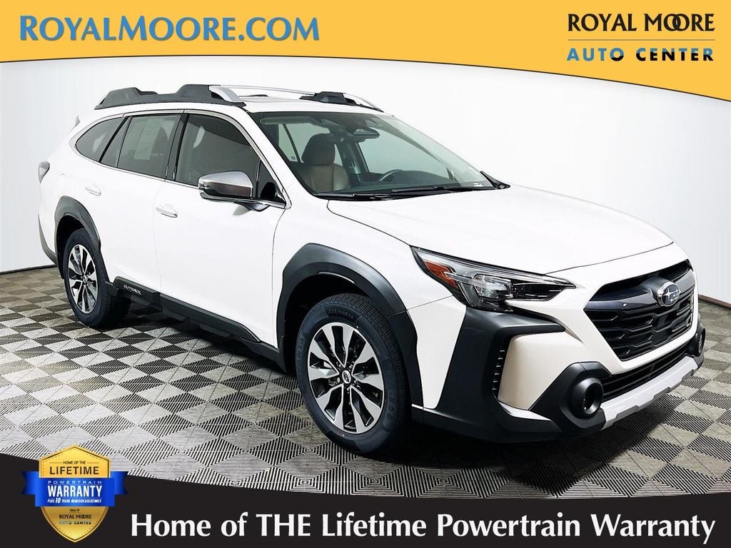 2023 Subaru Outback Touring XT in Crystal White Pearl — front three-quarter view