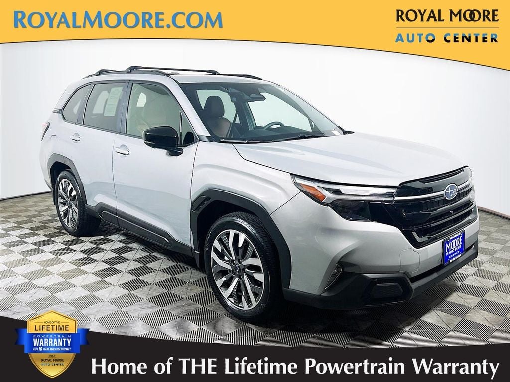 2025 Subaru Forester Touring in River Rock Pearl — front three-quarter view