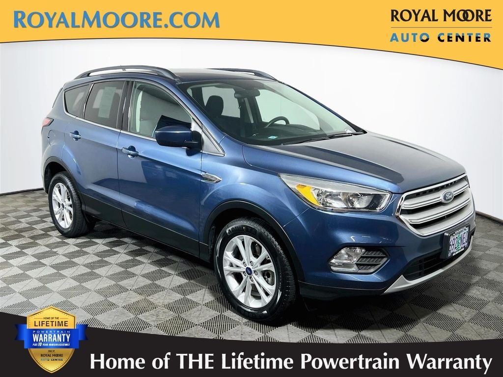 2018 Ford Escape SE in Blue Metallic — front three-quarter view
