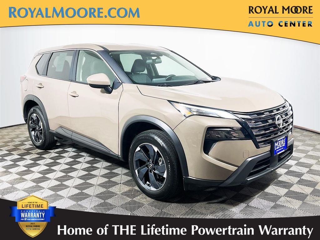 2025 Nissan Rogue SV in Baja Storm Metallic — front three-quarter view