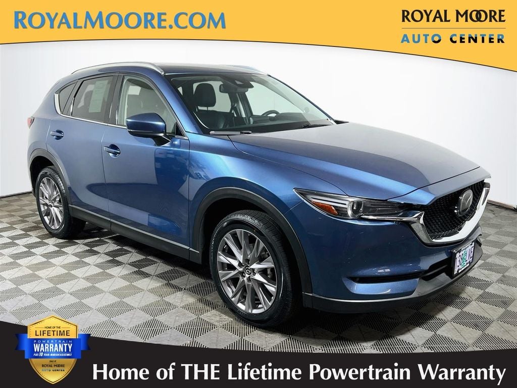 2019 Mazda Mazda CX-5 Grand Touring in Eternal Blue Mica — front three-quarter view