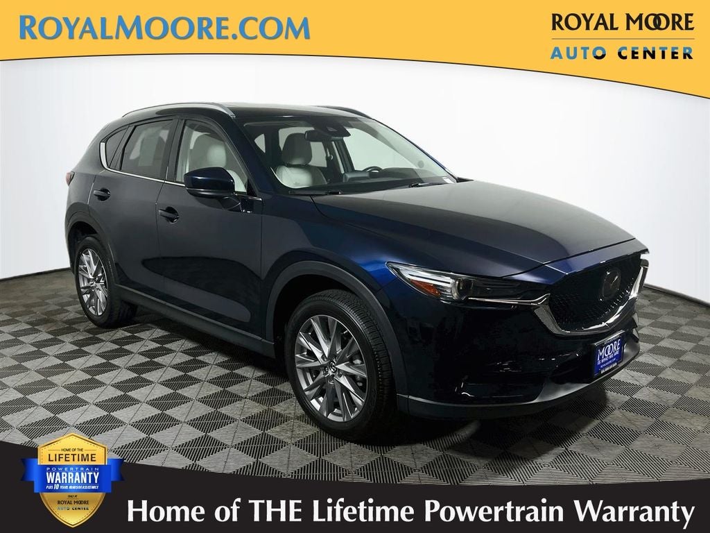 2020 Mazda Mazda CX-5 Grand Touring in Deep Crystal Blue Mica — front three-quarter view
