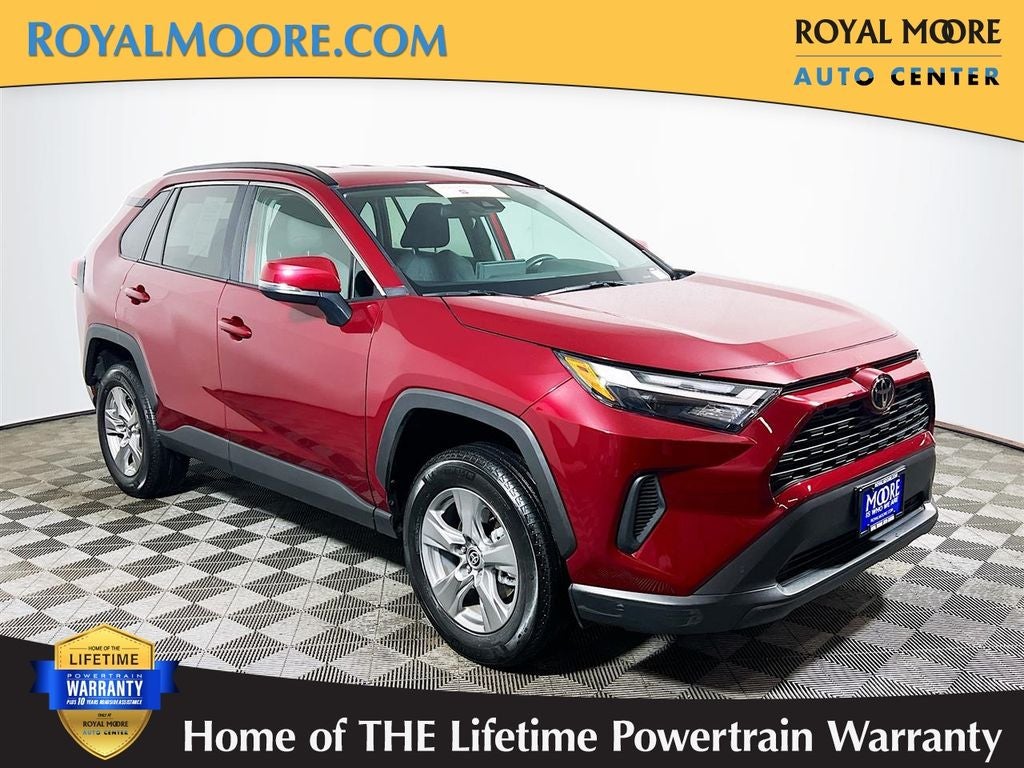 2025 Toyota RAV4 XLE in Ruby Flare Pearl — front three-quarter view
