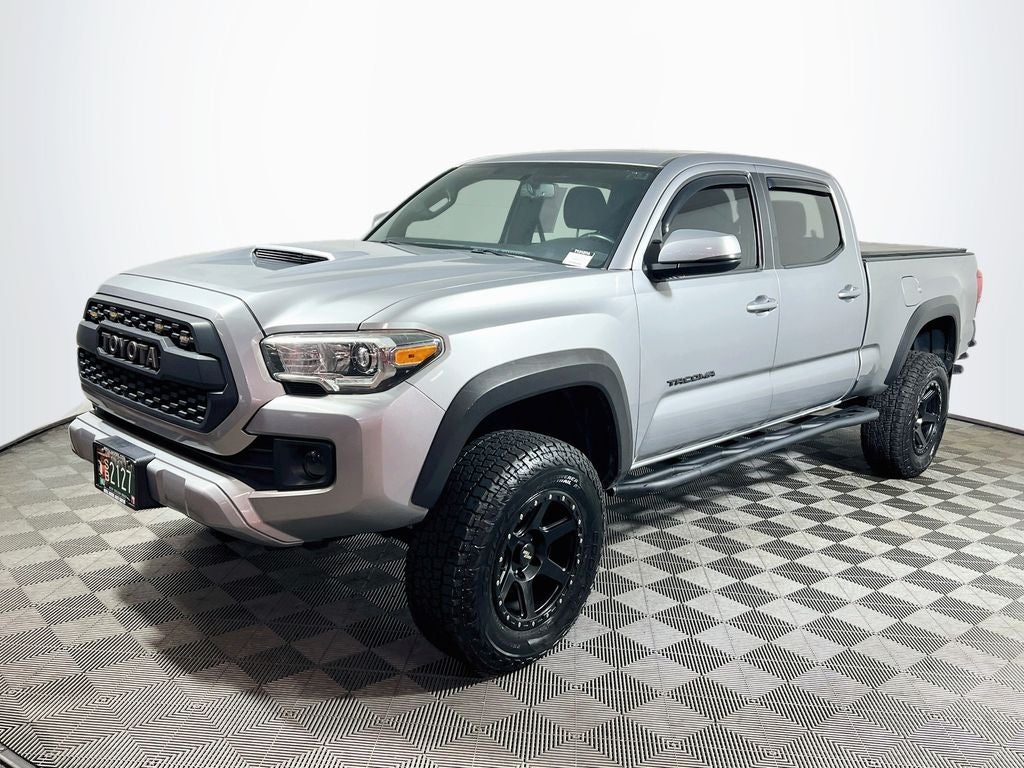 2016 Toyota Tacoma — rear three-quarter view