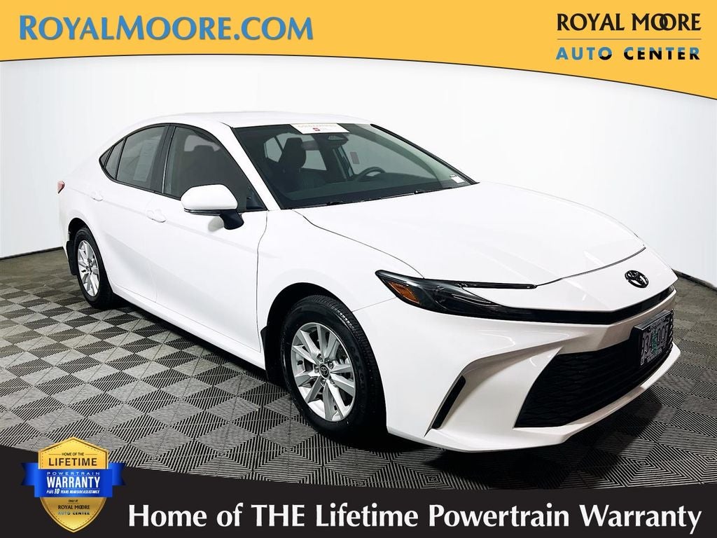 2025 Toyota Camry LE in Ice Cap — front three-quarter view