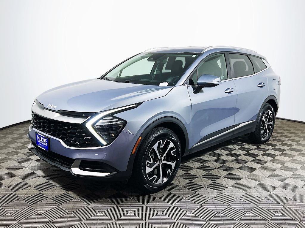 2024 Kia Sportage — rear three-quarter view