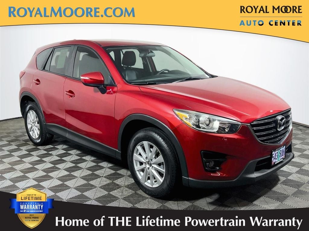 2016 Mazda Mazda CX-5 Touring in Soul Red Metallic — front three-quarter view