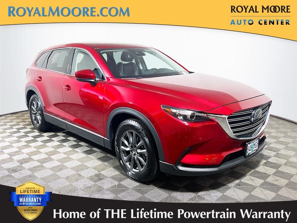 2021 Mazda Mazda CX-9 Touring in Soul Red Crystal Metallic — front three-quarter view