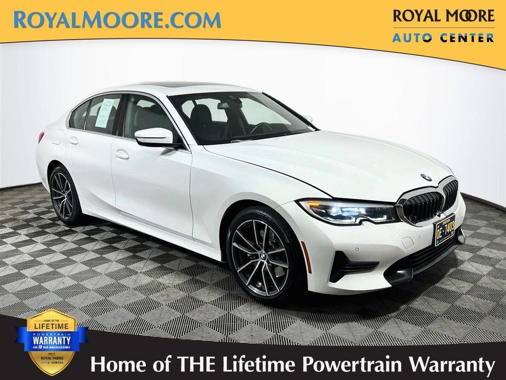 2019 BMW 3 Series 330i xDrive in Alpine White — front three-quarter view