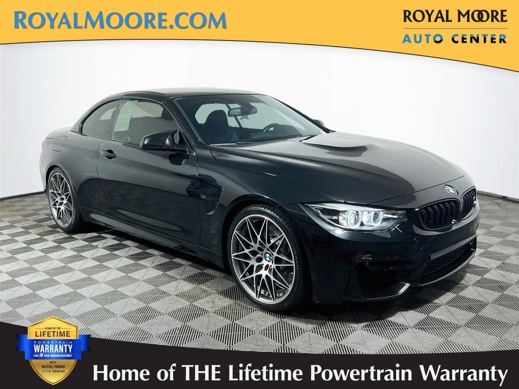 2018 BMW M4 Base in Black Sapphire Metallic — front three-quarter view